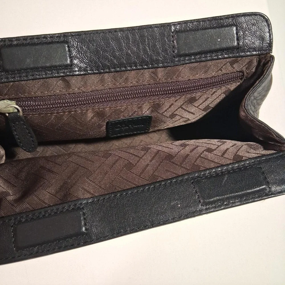 Womens Black leather clutch with textured pebbled finish great for make up